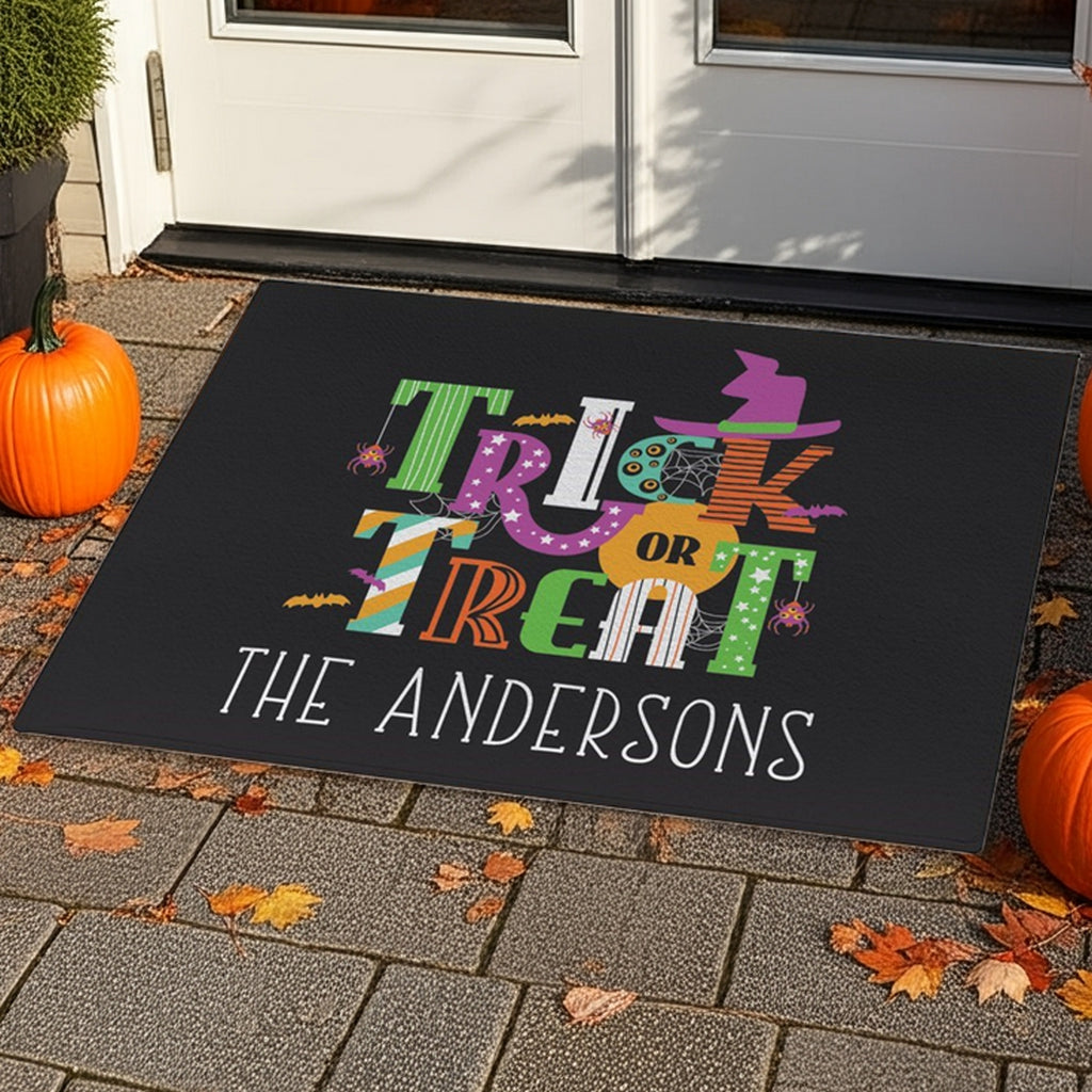 Halloween trick or treat personalized doormat with colorful design and custom family name