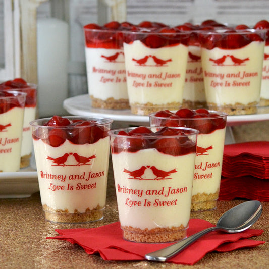 personalized 8 ounce clear plastic cups used for serving desserts on wedding dessert table