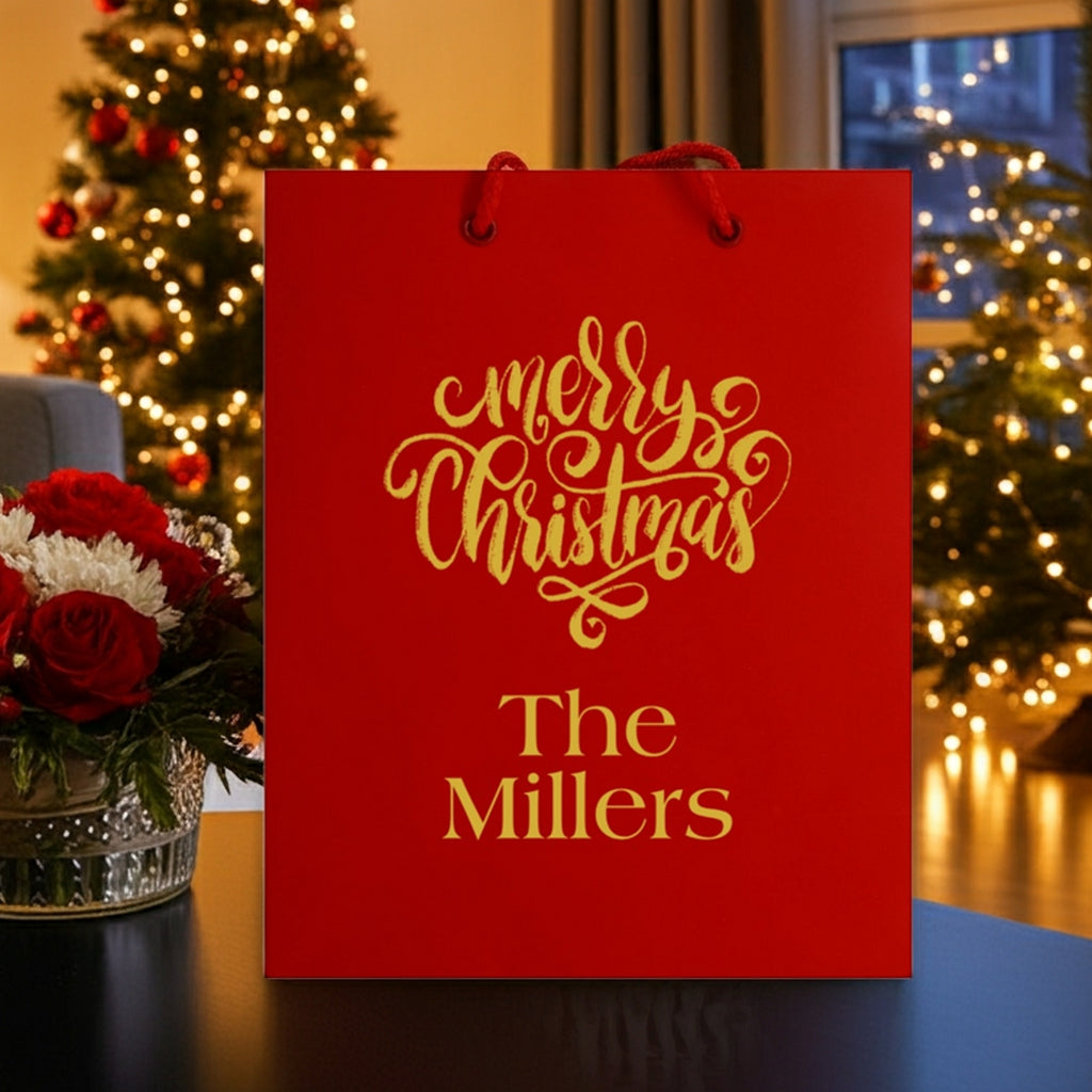 Personalized Christmas party gift bag with festive design and holiday decorations in the background