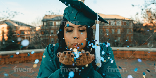 Graduation in graduation cap blowing confetti