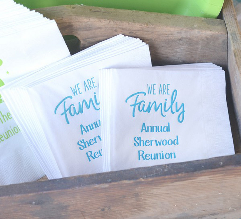 Personalized family reunion napkins in a wooden napkin holder