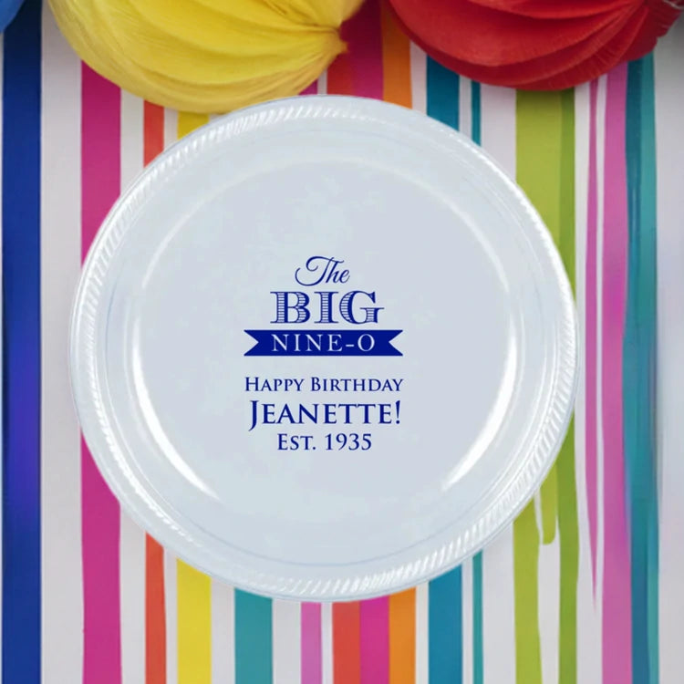 White plastic dinner plate personalized for 90th birthday in blue print