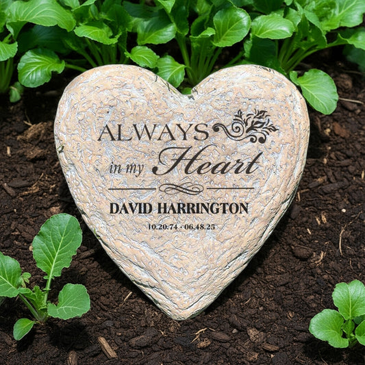 Always In My Heart personalized heart memorial garden stone placed in soil with green plants