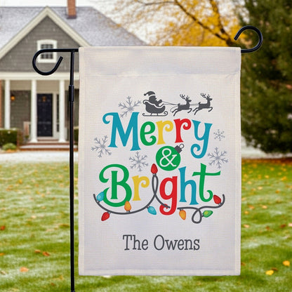 Christmas garden flag personalized with 'Merry & Bright' design featuring Santa, reindeer, and festive lights