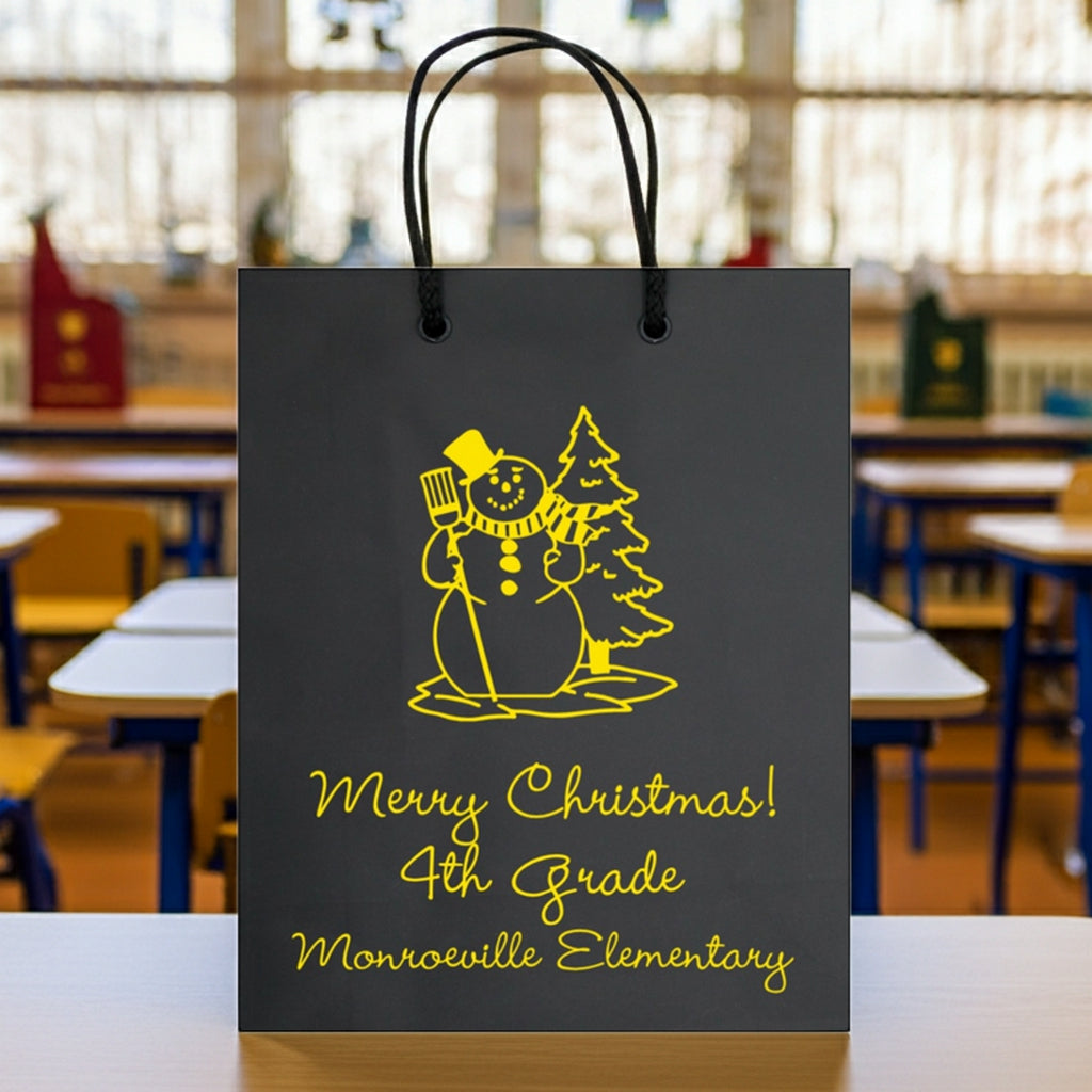 Tippytoad Christmas gift bags featuring a cheerful snowman design for school holiday celebrations