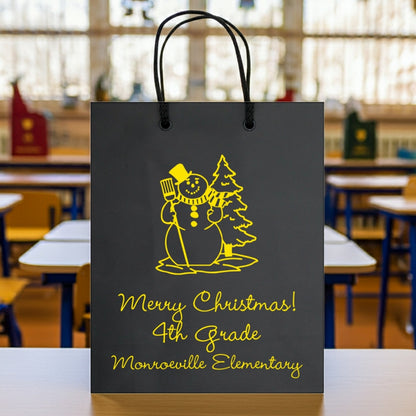 Tippytoad Christmas gift bags featuring a cheerful snowman design for school holiday celebrations
