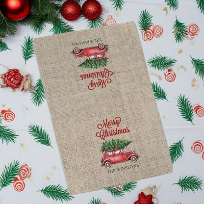 Personalized Christmas kitchen towel featuring a vintage car with a Christmas tree and custom family name