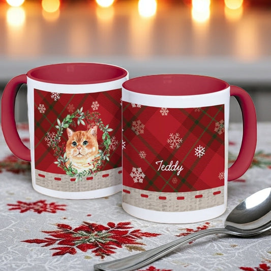 Christmas mug personalized with a cat design and pet name on a festive red plaid background