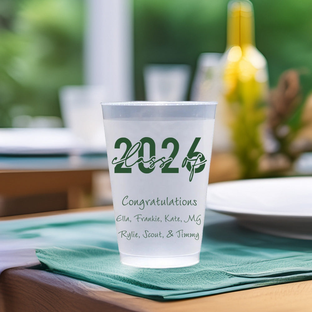 Small 12oz frosted plastic cups personalized with "Class of 2026" design and text "Congratulations, [Graduate Names] in Hunter Green print