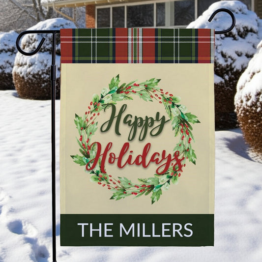 Personalized garden flag with a Happy Holidays wreath design and The Millers name in festive colors