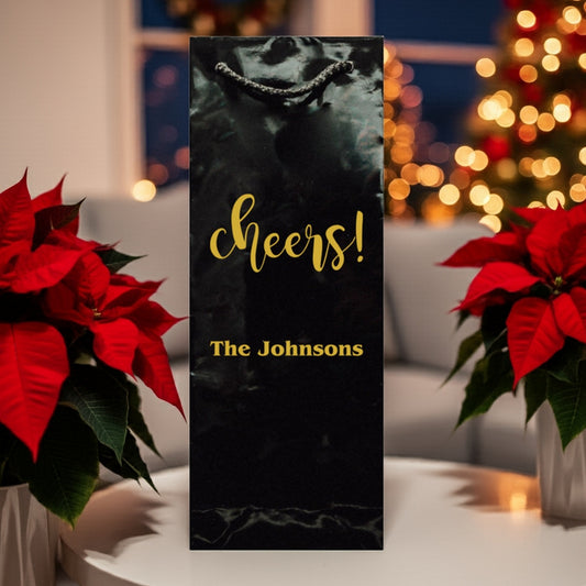 Custom Printed Christmas Wine Bottle Gift Bags black marble gift bag with gold cheers and personalized The Johnsons text