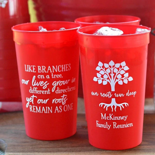Red 22 oz. family reunion stadium cups personalized with roots run deep design and 2 lines of custom text on front side like branches design on back side in white print