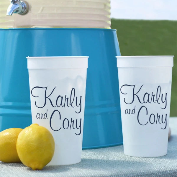 White 32 oz. plastic wedding cup personalized with bride and groom's names in navy blue imprint color