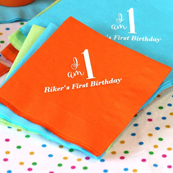 Orange color beverage napkins personalized for baby birthday with i am one design and custom text in white print
