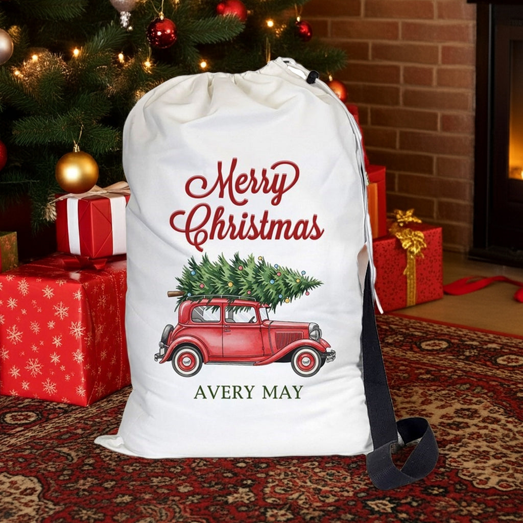 Santa sack featuring a vintage red truck with a Christmas tree and Merry Christmas design