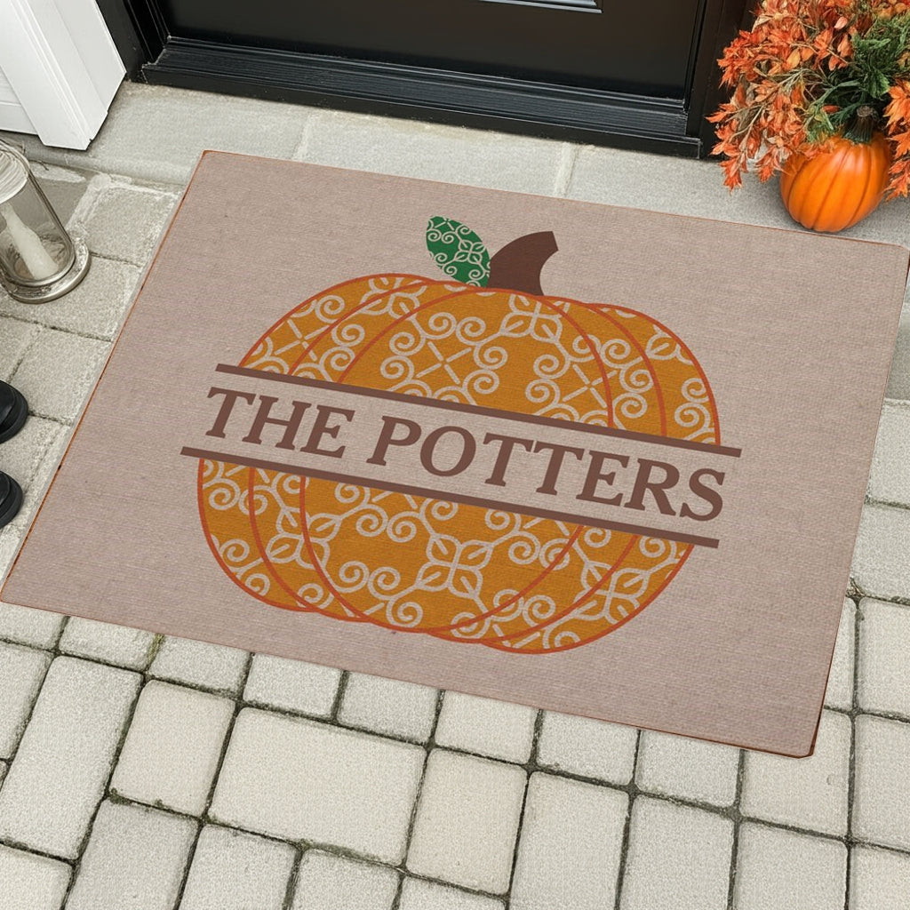 Decorative fall pumpkin personalized doormat with The Potters name and orange patterned pumpkin design
