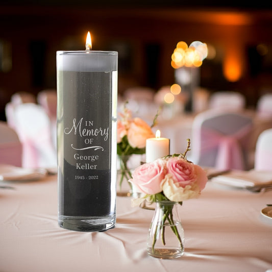 Personalized memorial memorial vase candle with In Memory Of George Keller engraving on a table with flowers