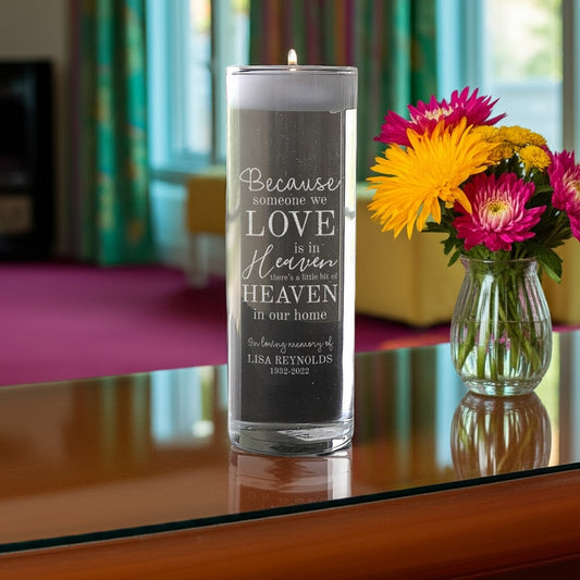 Someone we love personalized memory candle vase with tribute text and burning candle on table