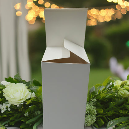 Tippytoad white wine bottle gift box open on greenery and lights foil stamped personalized Christmas wine bottle gift boxes