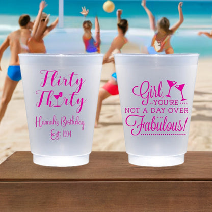 Frosted plastic adult birthday cups with vibrant designs for a fun celebration