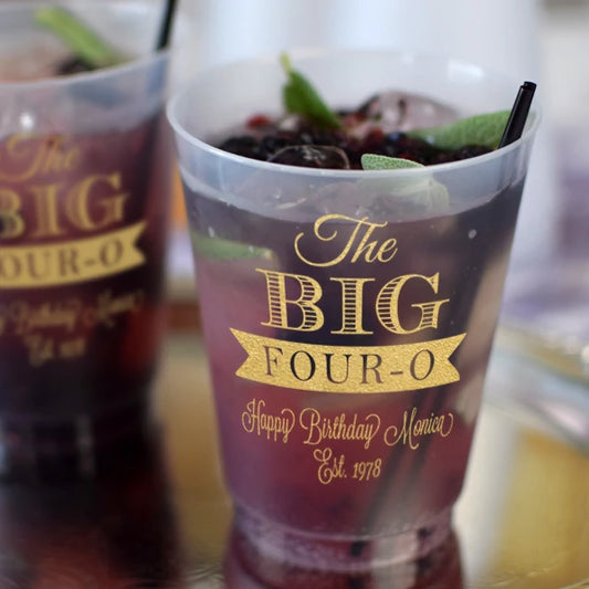 Frosted plastic adult birthday cups with gold text for a fun birthday celebration