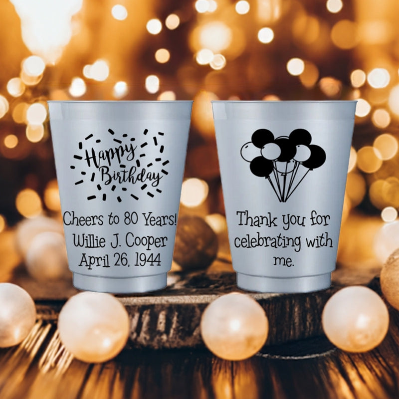 Frosted plastic adult birthday cups with personalized birthday messages and balloon design for party celebrations
