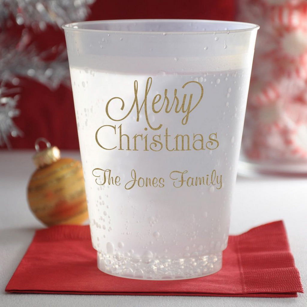 Frosted plastic Christmas party cups featuring Merry Christmas design for festive gatherings
