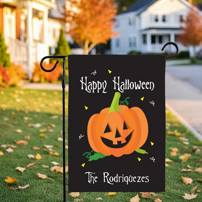 Black Halloween garden flag personalized with smiling jack o lantern and The Rodriquezes