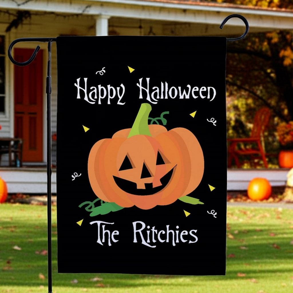 Black Halloween garden flag personalized with jack o lantern Happy Halloween and family name The Ritchies