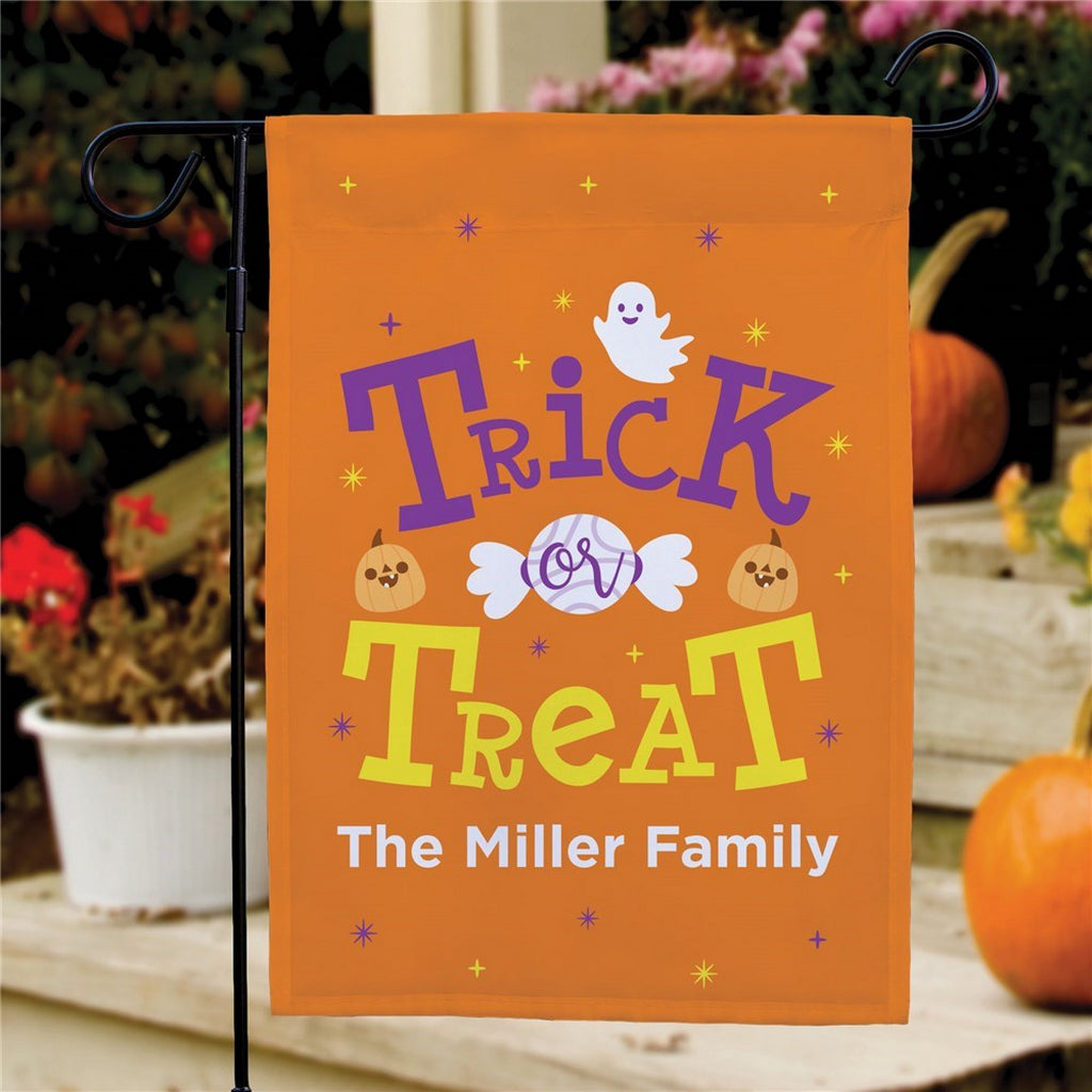 Halloween garden flag personalized orange Trick or Treat design with ghost pumpkins and The Miller Family name