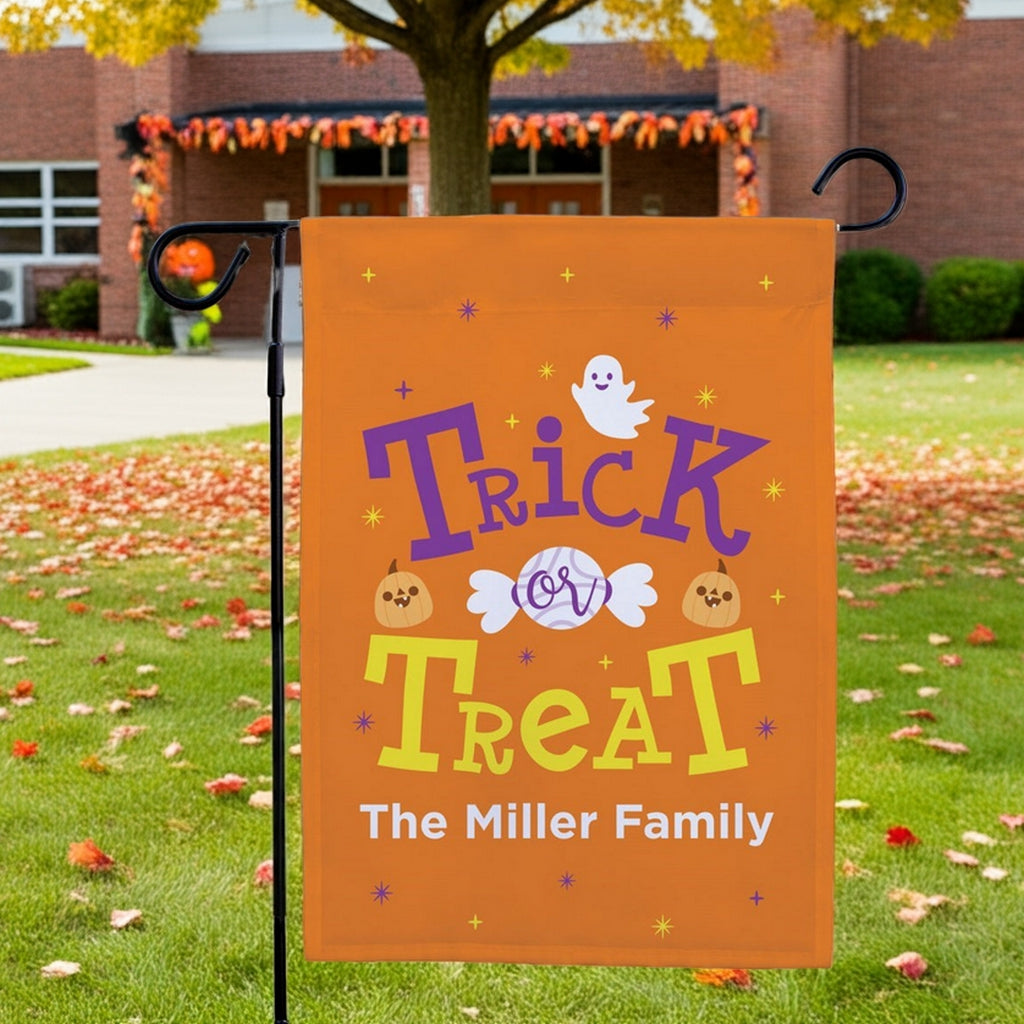 Orange Trick Or Treat Halloween garden flag personalized with ghost pumpkins and custom family name