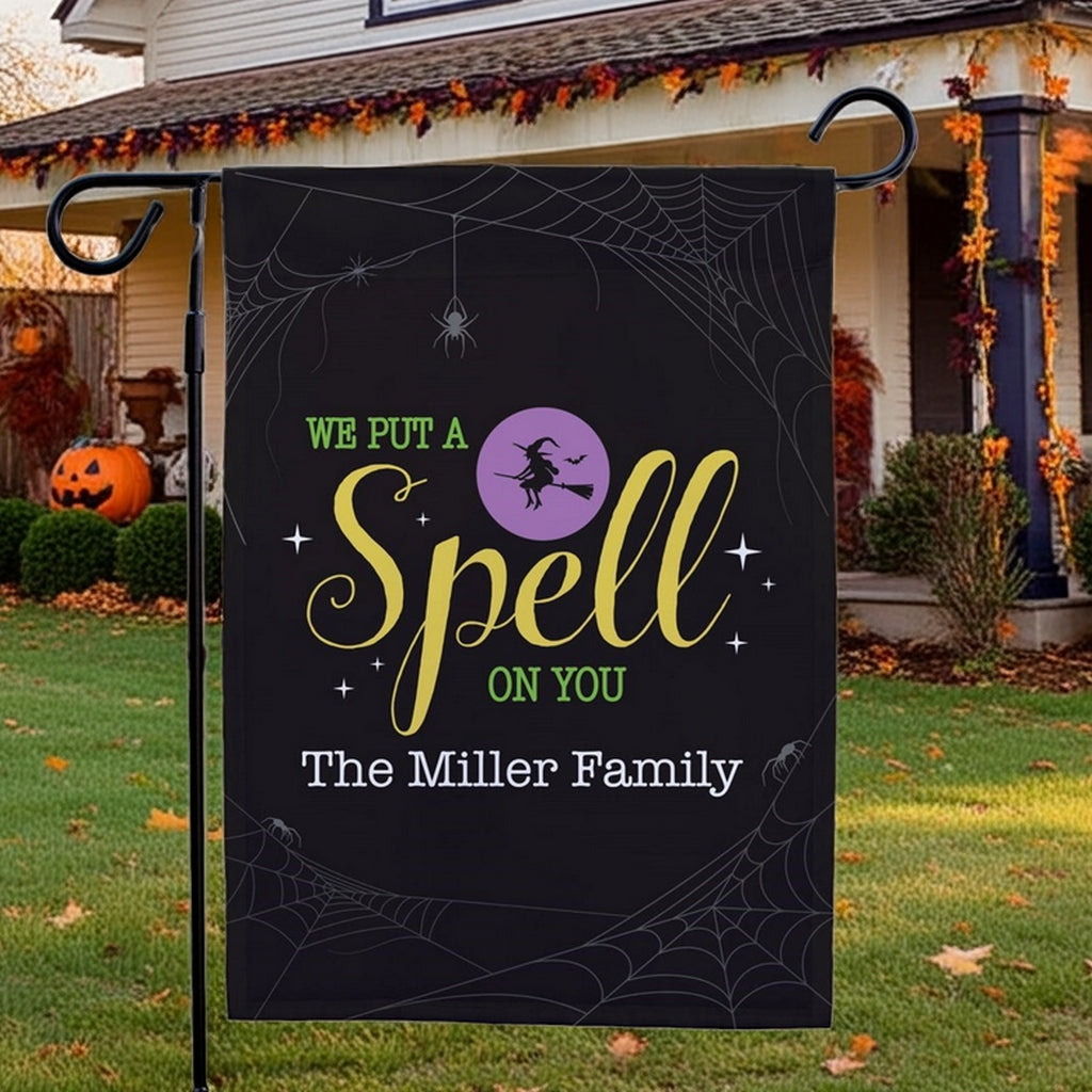 personalized Halloween garden flag black with witch silhouette purple moon spider webs and The Miller Family name