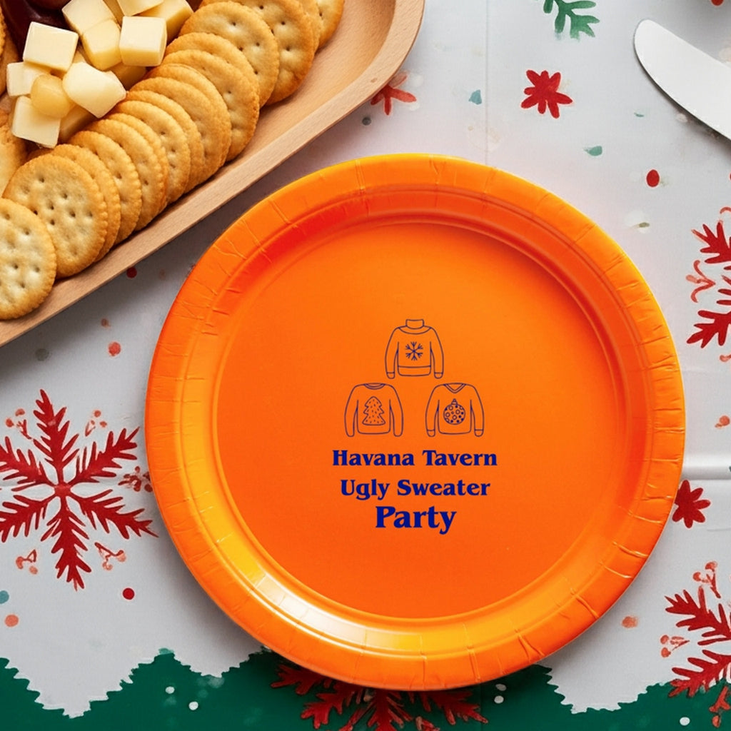 Paper Christmas plates in orange featuring a fun design for festive gatherings and ugly sweater parties