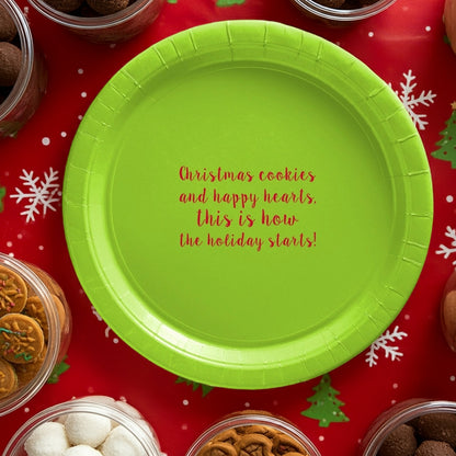 Bright green paper Christmas dinner plates with festive holiday message for seasonal celebrations