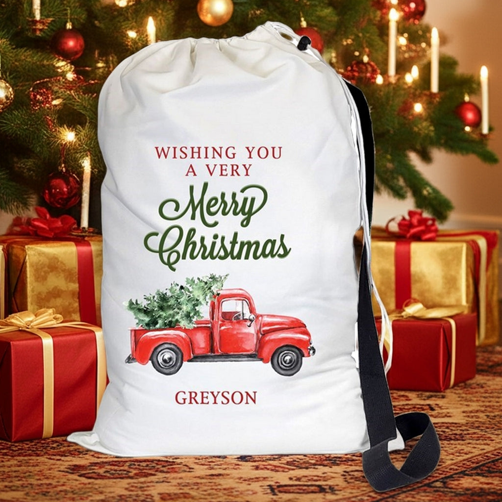 Pro Gift Source Santa sack featuring a vintage red truck with Christmas tree for festive gift storage