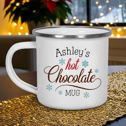 Christmas mug featuring personalized name over hot chocolate design with festive decorations