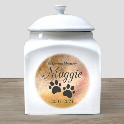 In loving memory personalized white ceramic pet urn with paw prints and name Maggie