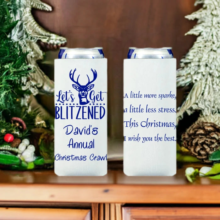 White slim Christmas can cooler sleeve personalized with lets get blitzened deer design and custom text in blue print