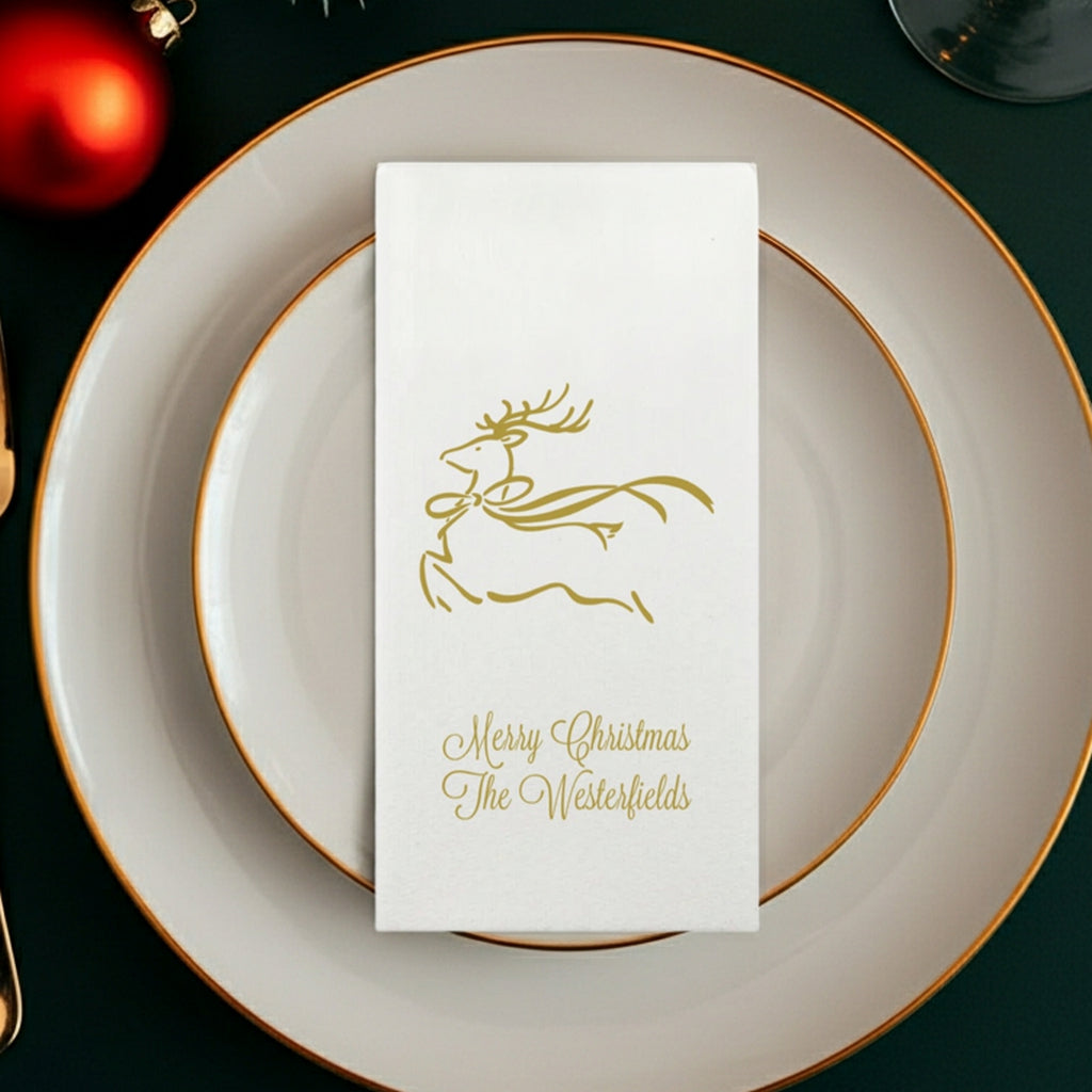 Tippytoad luxury linen feel Christmas dinner napkin personalized with  a holiday reindeer design and custom text