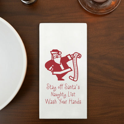 Luxury linen feel Christmas dinner napkins custom printed with Santa and a humorous message about hand washing