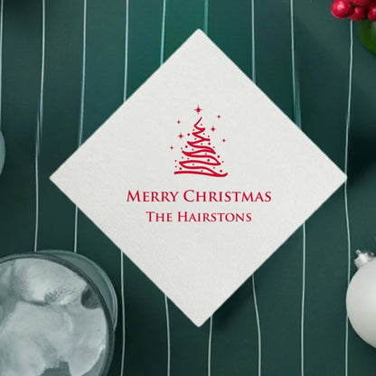 White luxury linen feel disposable beverage napkin personalized with abstract Christmas tree design and custom text in red print