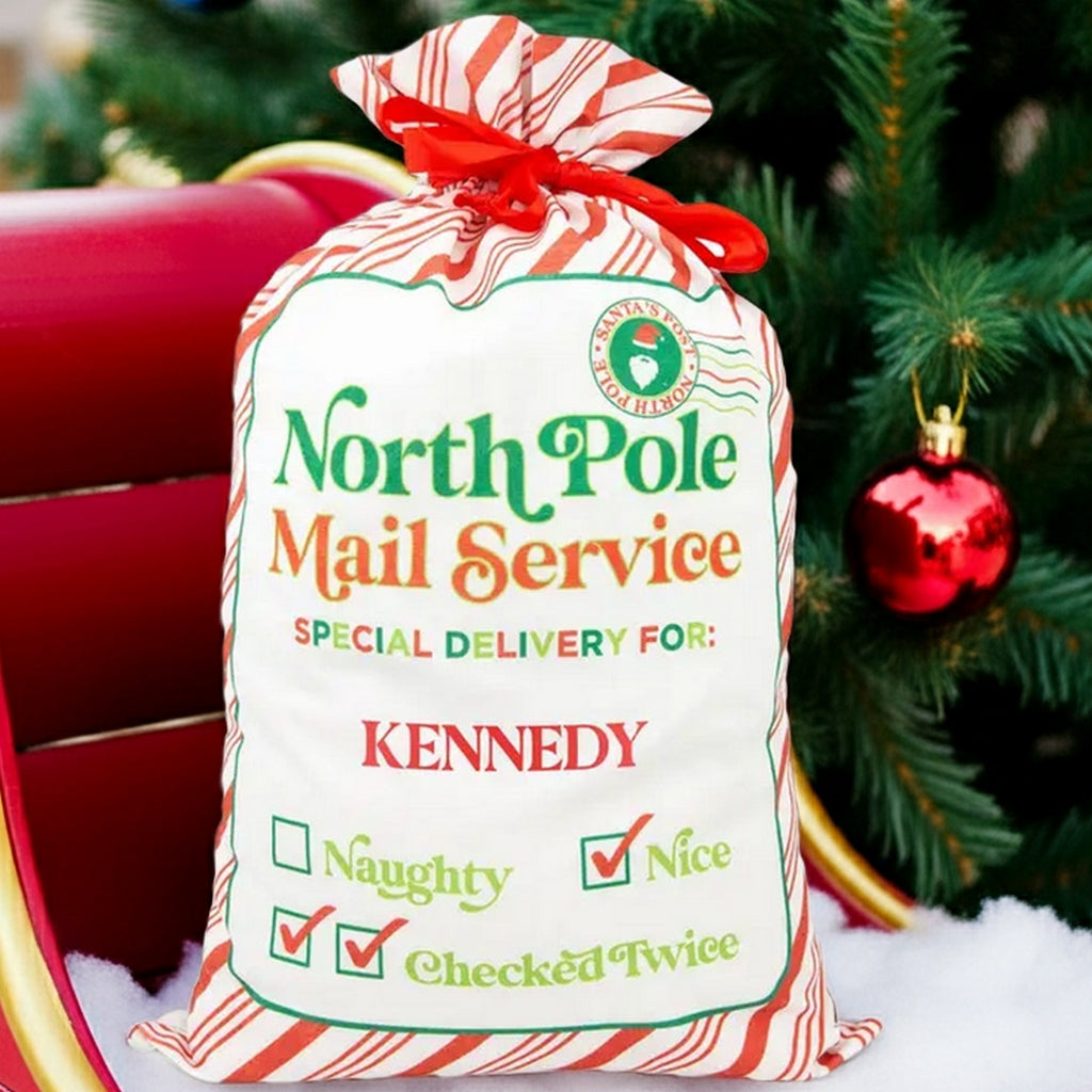 Personalized Santa gift sack with North Pole Delivery design and festive colors