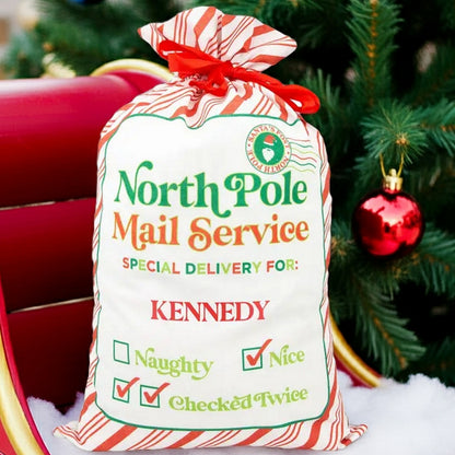 Personalized Santa gift sack with North Pole Delivery design and festive colors