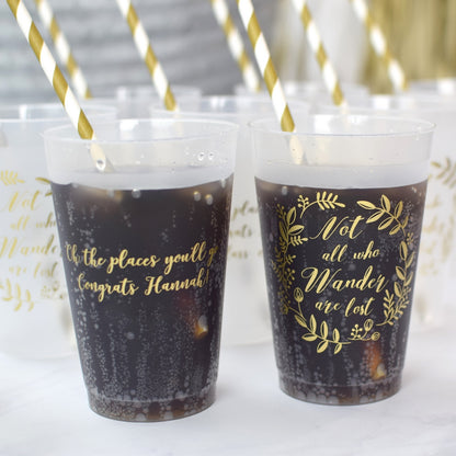 Clear frosted 14 oz. graduation cups personalized in gold print with "Oh ,the places you'll go, Congrats [Graduate Name]! and "Not All Who Wander" design filled with cola