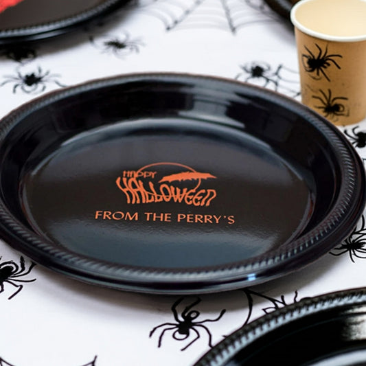 Black plate with orange Happy Halloween From the Perrys text on spider table personalized 10 inch plastic halloween dinner plates
