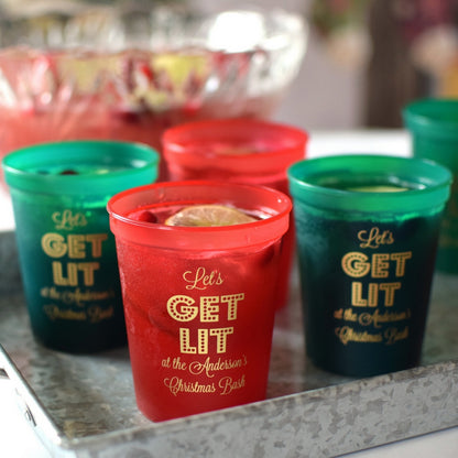 translucent red, green 16 oz. stadium cups personalized with get lit christmas design and custom text in gold print