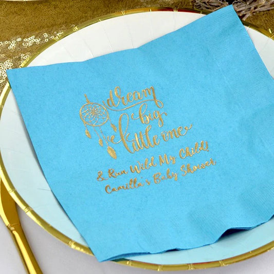 Caribbean blue baby shower napkins personalized with dream big little one design and custom text in gold print