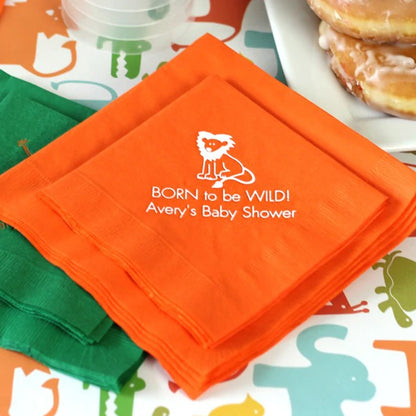 Orange color personalized baby shower beverage napkins personalized with lion design and 2 lines of custom text in white print for jungle born to be wild theme baby shower