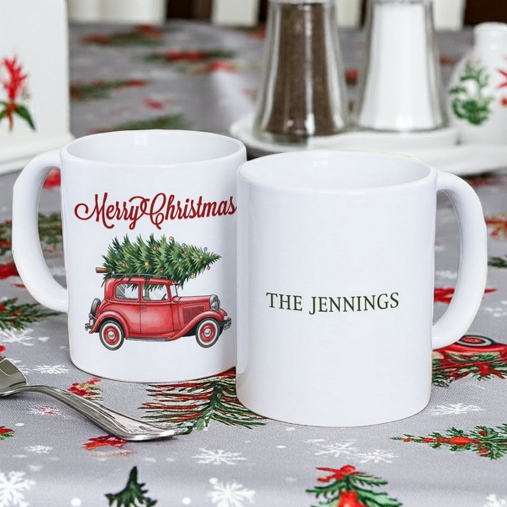 Personalized Christmas mug featuring a vintage car with a Christmas tree and custom name option