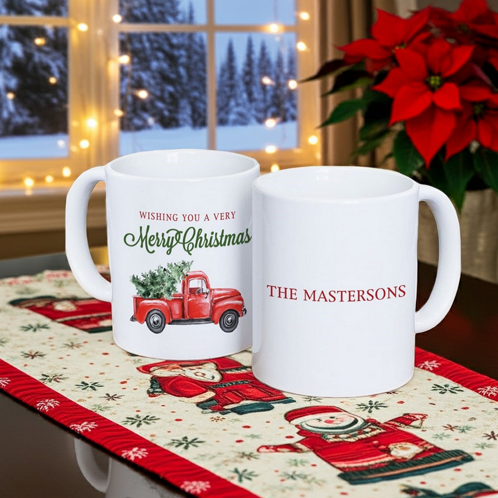 Personalized Christmas mug featuring a red truck design and custom text for festive holiday cheer